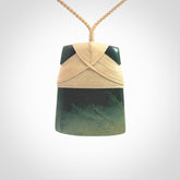 Hand carved from a lovely piece of local New Zealand Jade, a large and chunky Toki pendant. The quality of the workmanship and design is outstanding - this is a piece you will want to wear all the time. We have suspended this from a 4-plait beige cord which can be adjusted with a couple of slip knots and beige binding.